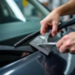 Werkzeuge für die Reparatur von Autoscheiben