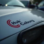 Huk-Coburg Logo auf einem Auto