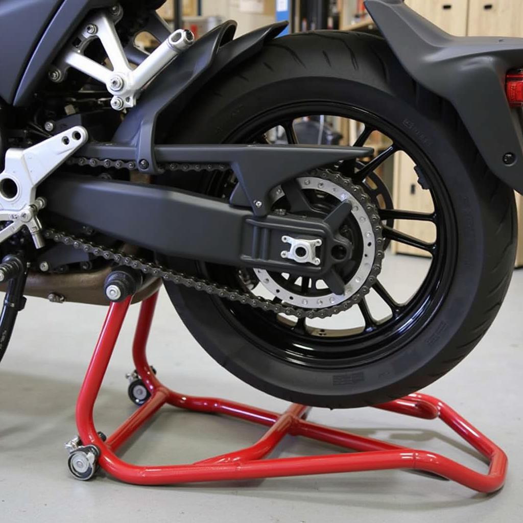 Performing maintenance tasks on a motorcycle using a center stand