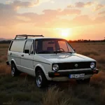 VW Caddy Oldtimer im Sonnenuntergang