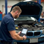 BMW Diagnose mit OBD Scanner in der Werkstatt