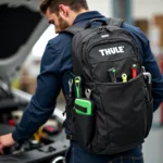 Thule Backpack im Einsatz bei der Autoreparatur