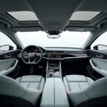 Geräumiger und luxuriöser Innenraum des Audi e6 e-tron mit digitalen Anzeigen