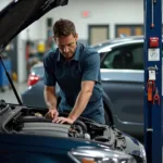 Autowerkstatt in Dorsten mit Mechaniker bei der Arbeit.