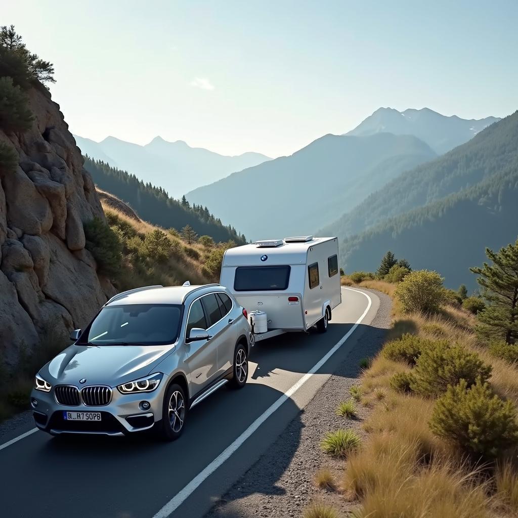 BMW X1 xDrive20d mit Anhänger auf Bergstraße