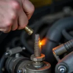 Anwendung des Bunsenbrenners in der Autowerkstatt zum Lösen von festsitzenden Schrauben.