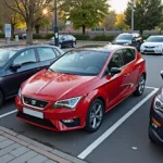 Seat Leon parkt in enger Parklücke.