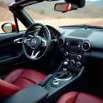 Mazda MX-5 Innenraum: Fahrerorientiertes Cockpit mit hochwertigen Materialien.